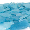 Close-up of Turquoise, textured tiles with a detailed surface pattern.