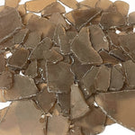 Close-up of Brown, textured tiles with a detailed surface pattern.