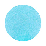 Sky Blue colored sand arranged in a circular shape on a white background