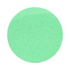 Mint Green colored sand arranged in a circular shape on a white background