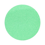 Mint Green colored sand arranged in a circular shape on a white background
