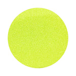 Apple Green colored sand arranged in a circular shape on a white background