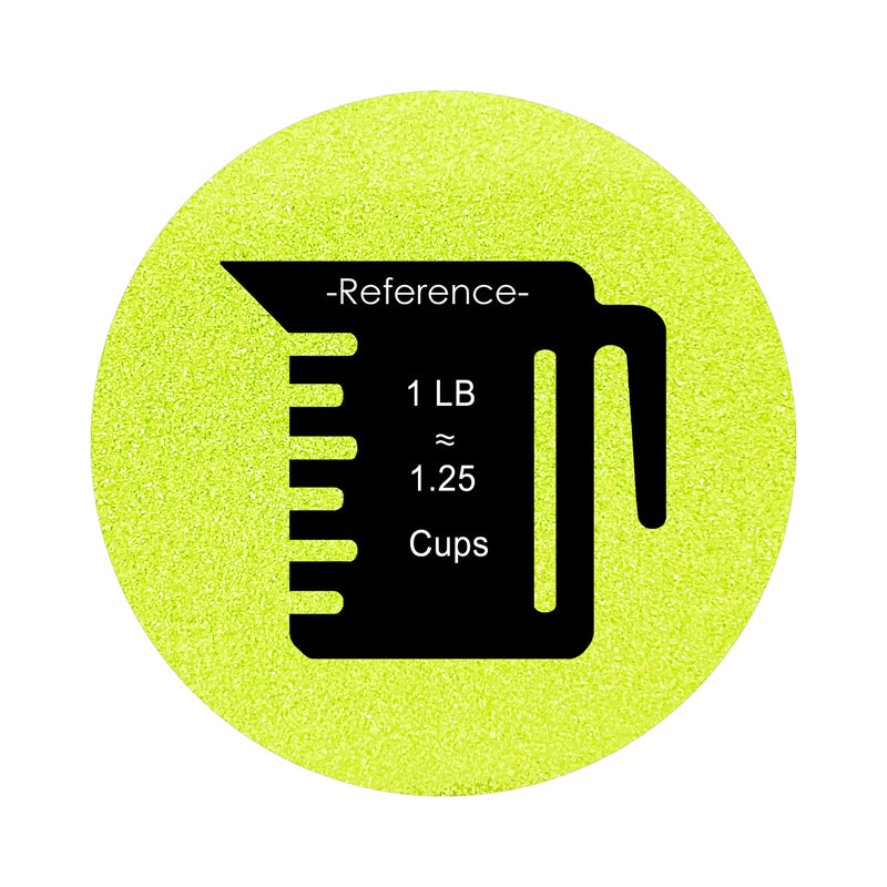 Apple Green colored sand arranged in a circular shape on a white background colored sand in a circular shape with a measuring cup showing quantity.