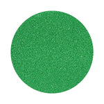 Emerald Green colored sand arranged in a circular shape on a white background