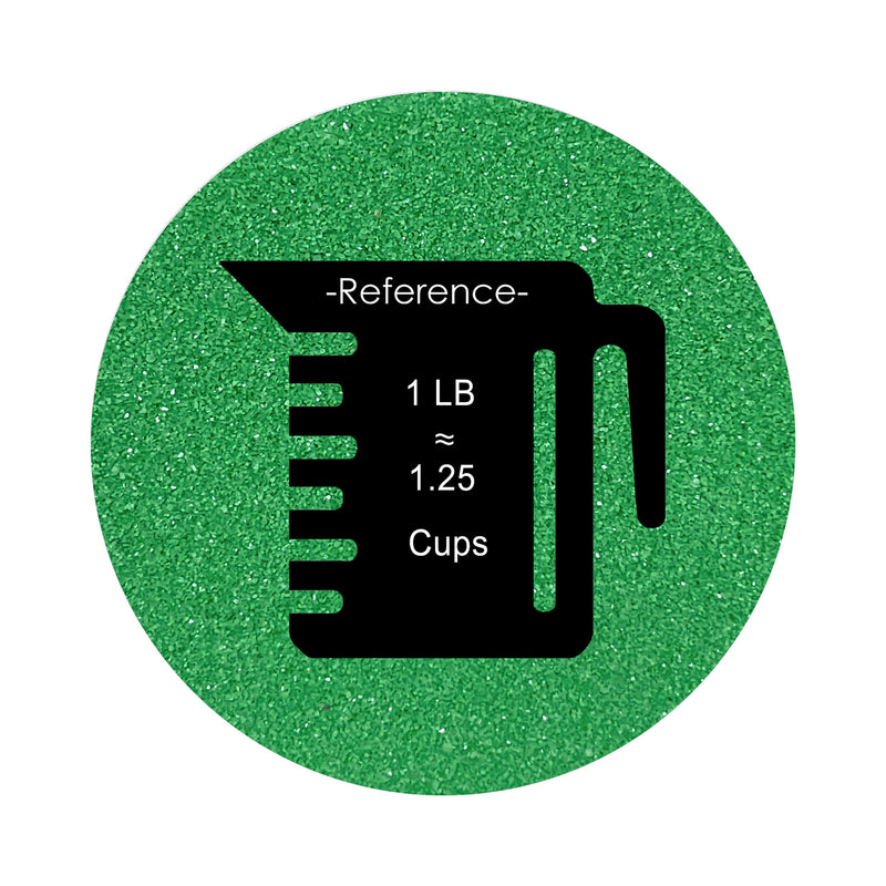 Emerald Green colored sand arranged in a circular shape on a white background colored sand in a circular shape with a measuring cup showing quantity.