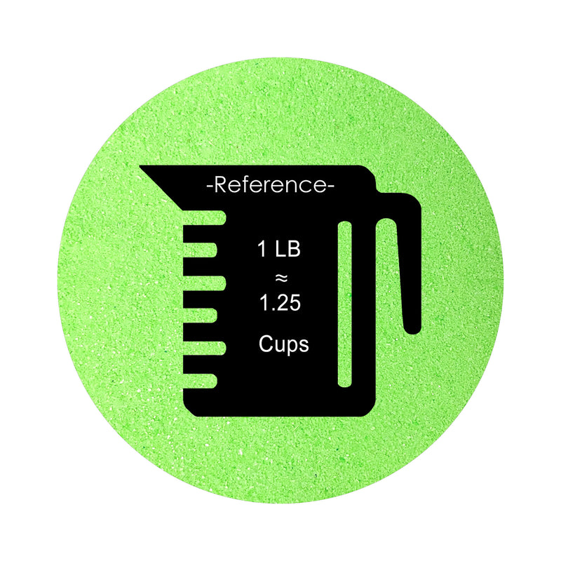Neon Green colored sand arranged in a circular shape on a white background colored sand in a circular shape with a measuring cup showing quantity.