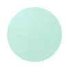 Mint Blue colored sand arranged in a circular shape on a white background