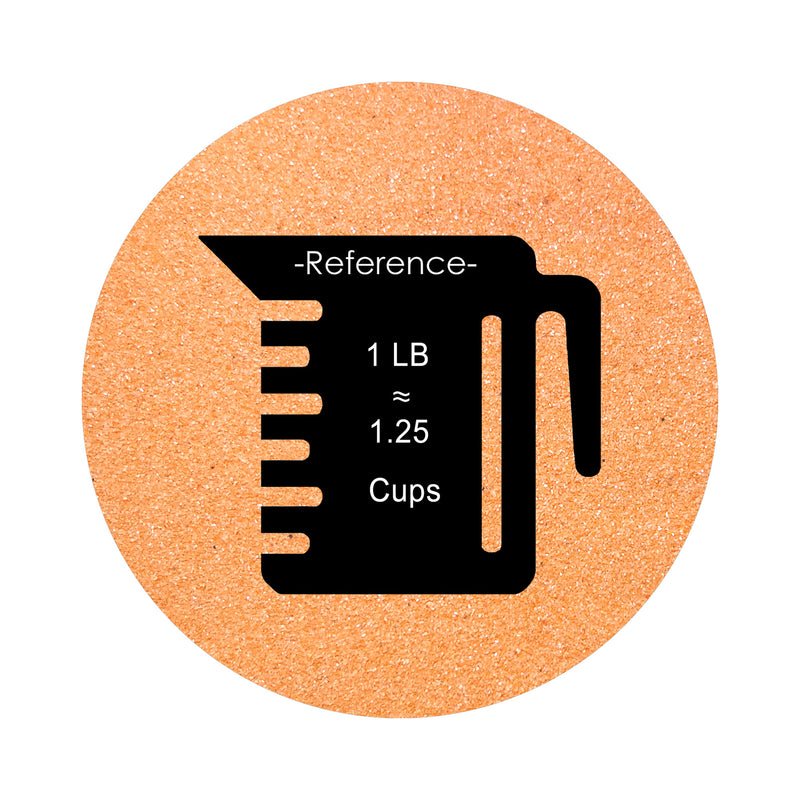 peach orange colored sand arranged in a circular shape on a white background colored sand in a circular shape with a measuring cup showing quantity.
