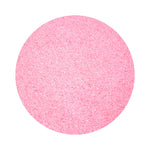 Hot Pink colored sand arranged in a circular shape on a white background