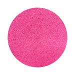 Dark Pink colored sand arranged in a circular shape on a white background