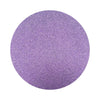 Violet Purple colored sand arranged in a circular shape on a white background