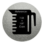 Silver colored sand arranged in a circular shape on a white background colored sand in a circular shape with a measuring cup showing quantity.