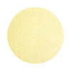 Buttermilk Yellow colored sand arranged in a circular shape on a white background