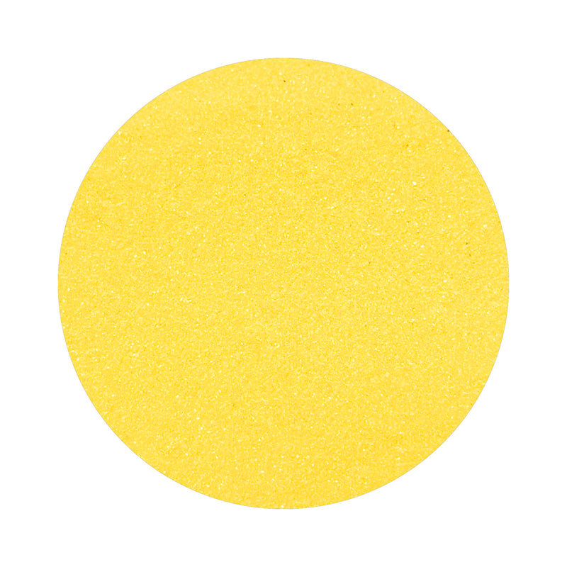 Dark Yellow colored sand arranged in a circular shape on a white background