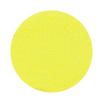 Lemon Yellow colored sand arranged in a circular shape on a white background