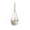 Beige hanging planter with rope on a white background