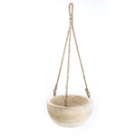 Beige hanging planter with rope on a white background