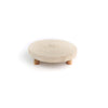 Round wooden stool on a white background