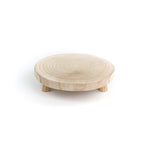 Round wooden stool with a white background