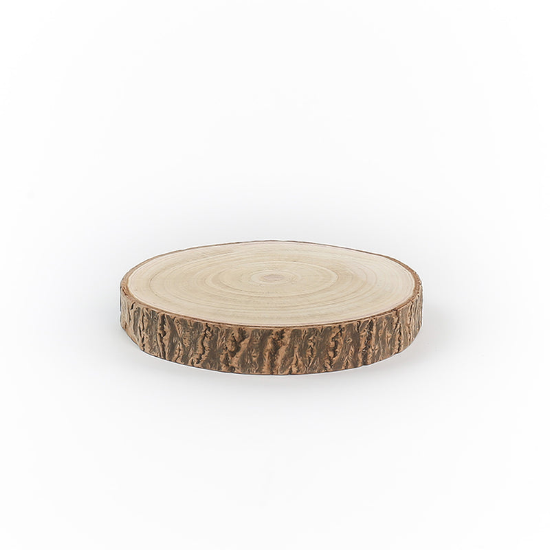 Wooden circular disc with a natural bark edge on a white background