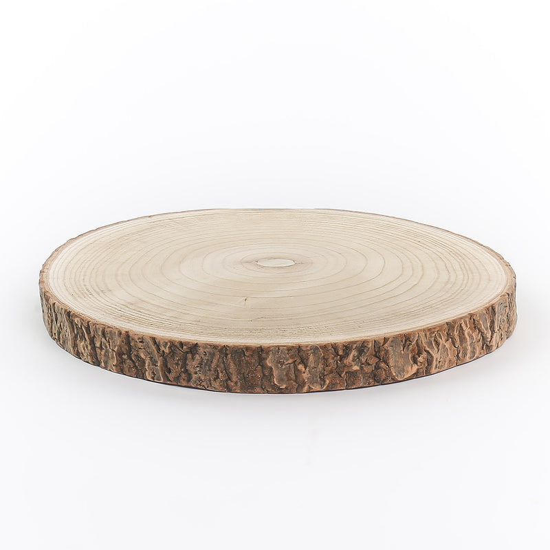 Round wooden disc with a natural bark edge on a white background
