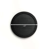 Black circular object with a measurement label on a white background
