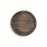Round wooden tray on a white background