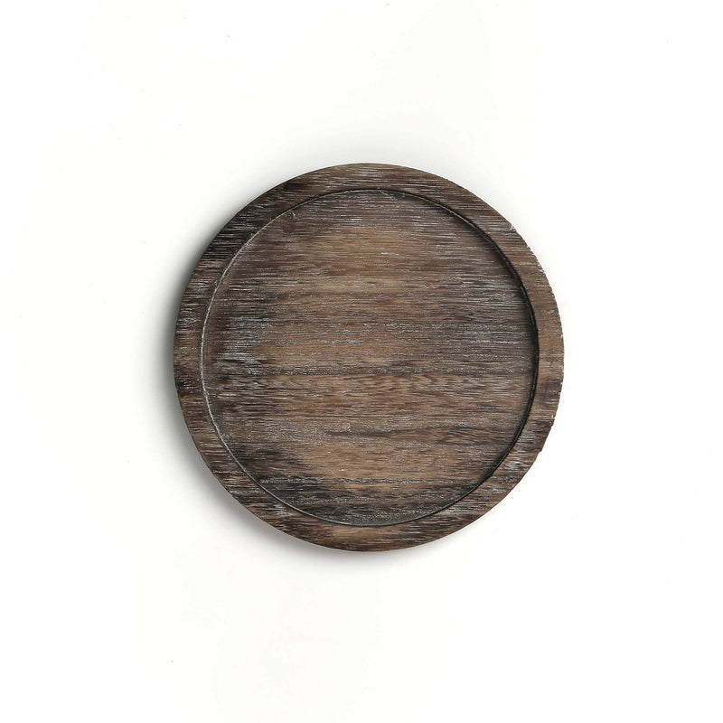 Round wooden tray on a white background