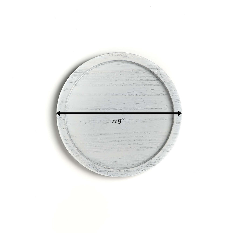 Round wooden tray with measurement label on a white background