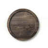 Round wooden tray on a white background