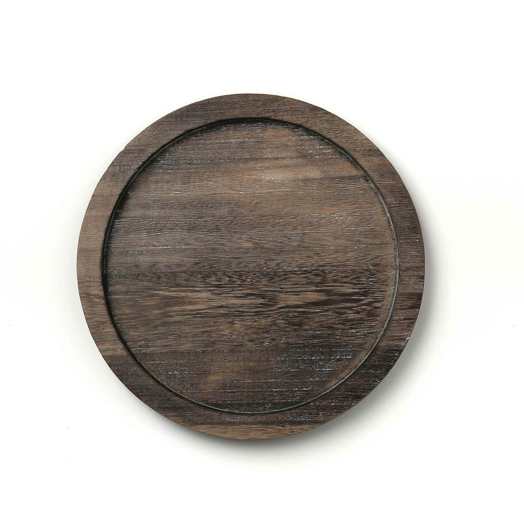Round wooden tray on a white background