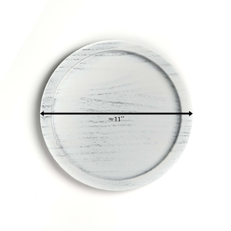 Round marble-patterned object with a measurement label on a white background