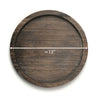 Wooden round tray with measurement label on a white background