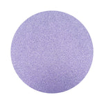 lavender purple colored sand arranged in a circular shape on a white background