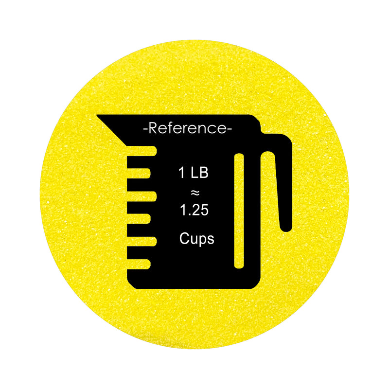 yellow colored sand arranged in a circular shape on a white background colored sand in a circular shape with a measuring cup showing quantity.