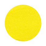 yellow colored sand arranged in a circular shape on a white background