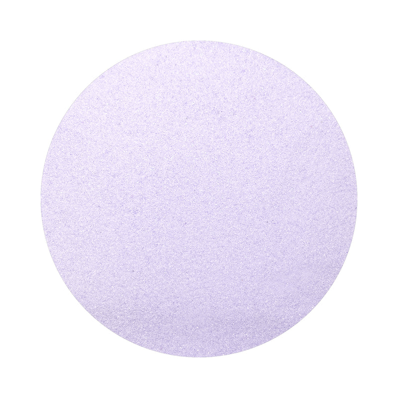 Light Violet colored sand arranged in a circular shape on a white background