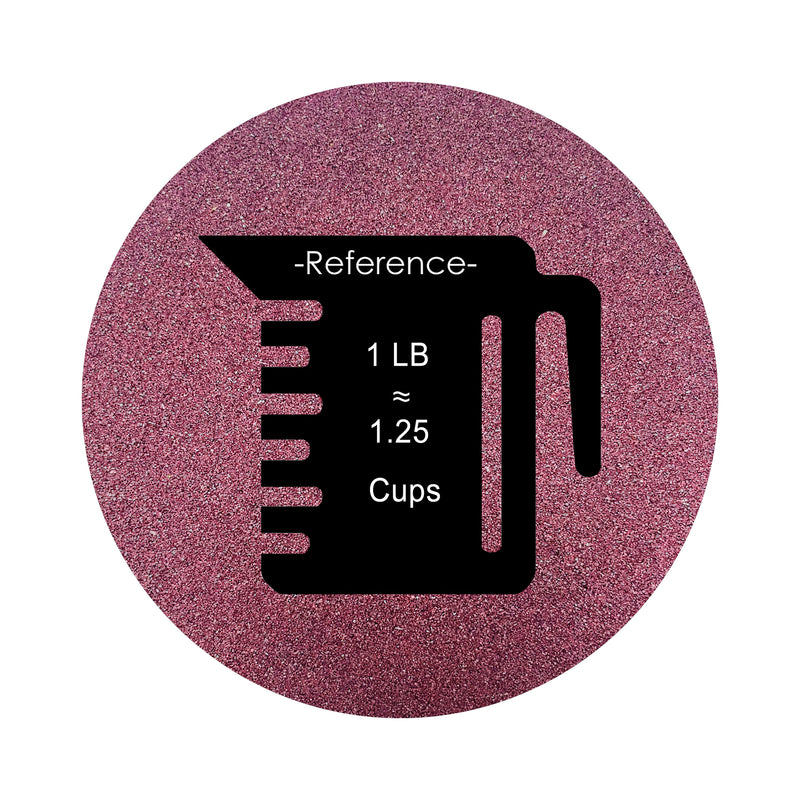 Wine colored sand arranged in a circular shape on a white background colored sand in a circular shape with a measuring cup showing quantity.